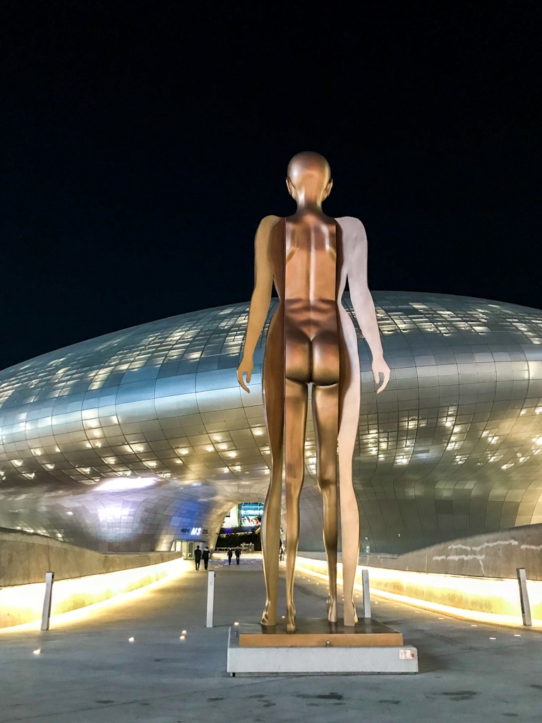 Dongdaemun Design Plaza night view with sculpture