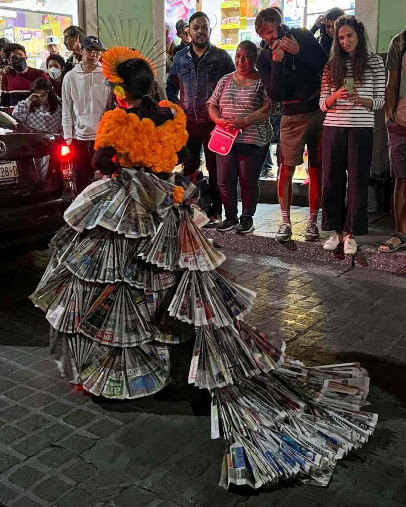 costume in the Calaveras and Catrinas Parade