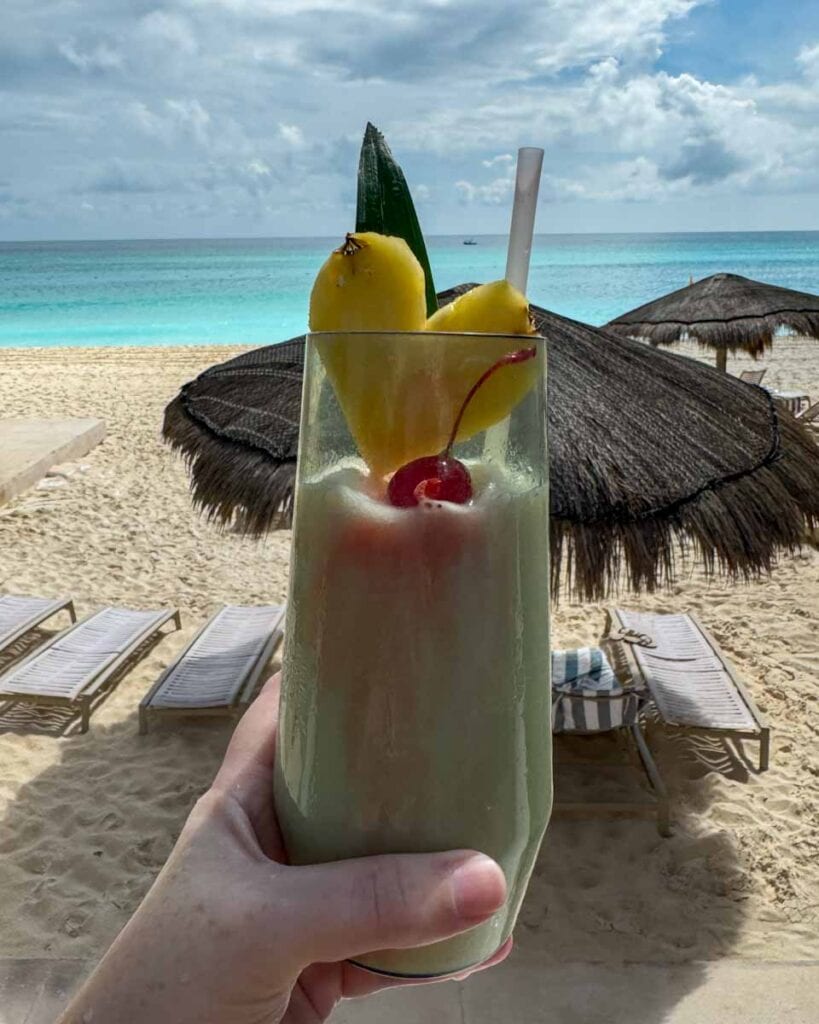 pina colada at the edge of the adult pool