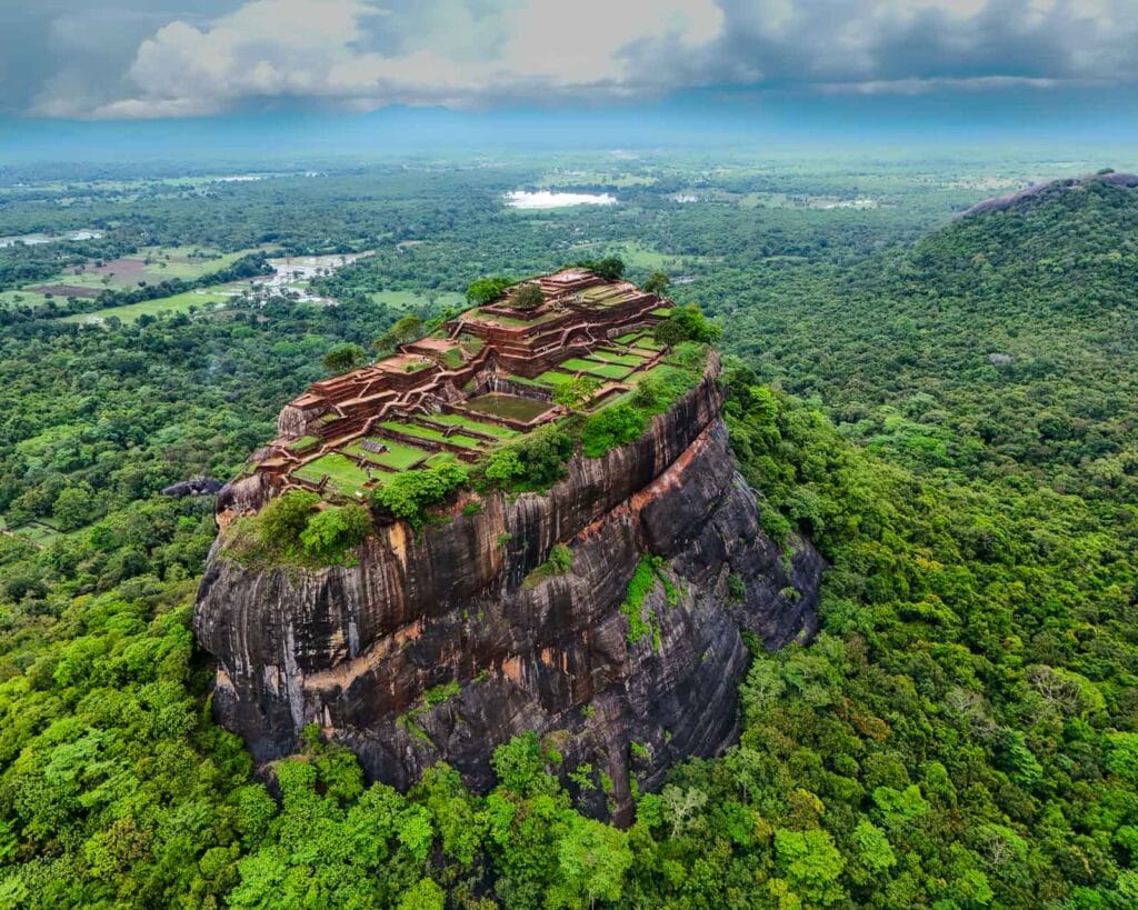 aerial photo of Sigiriya Rock a UNESCO site rising from the jungle in Sri Lanka