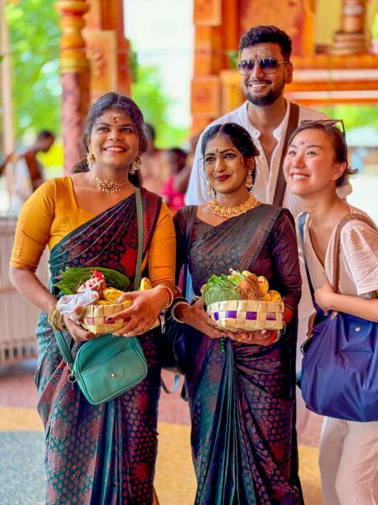 posing for photos at Nagapooshani Amman Kovil